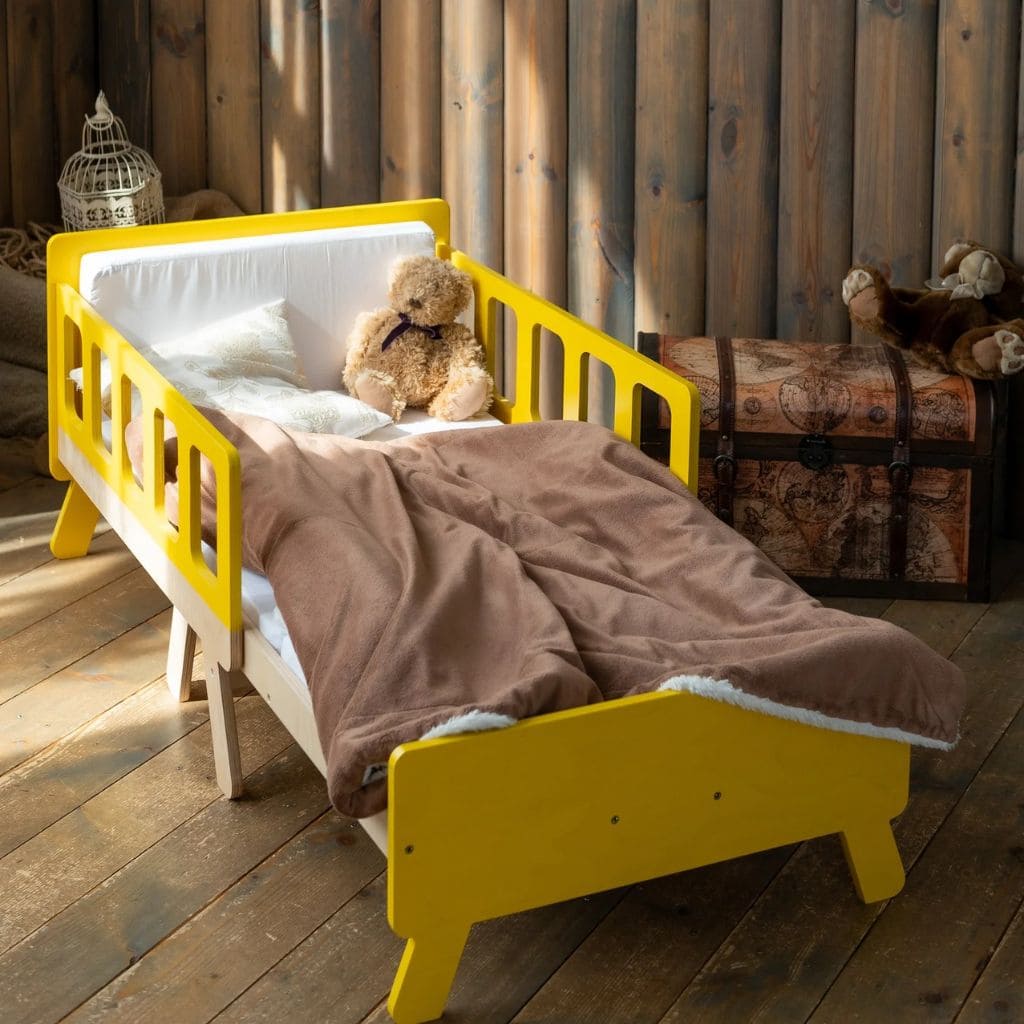 Cama infantil convertible con almacenaje - De bebé a junior en amarillo | muebles Tinitto – Fabricación europea
